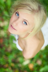 Fototapeta premium portrait of a beautiful girl in the garden