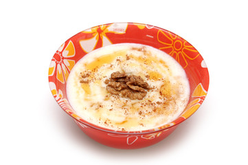 semolina porridge with nuts, raisin and honey