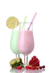 Milk shakes with fruits isolated on white