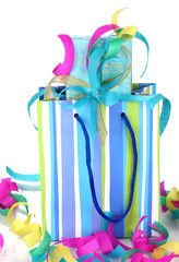Colorful gift bags and gifts  with serpentine close-up isolated