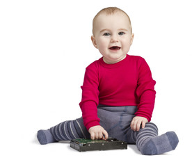 young child in white background with hard drive