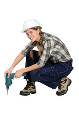 Woman holding drill