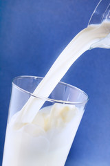 milk pouring into glass