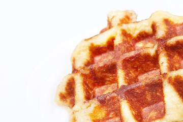Waffle closeup against white background with text space