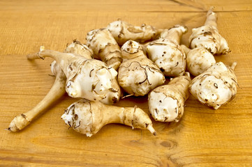 Fototapeta premium Jerusalem artichokes on the board