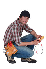 Man taking electrical reading