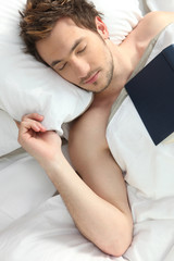 Man who fell asleep reading a book