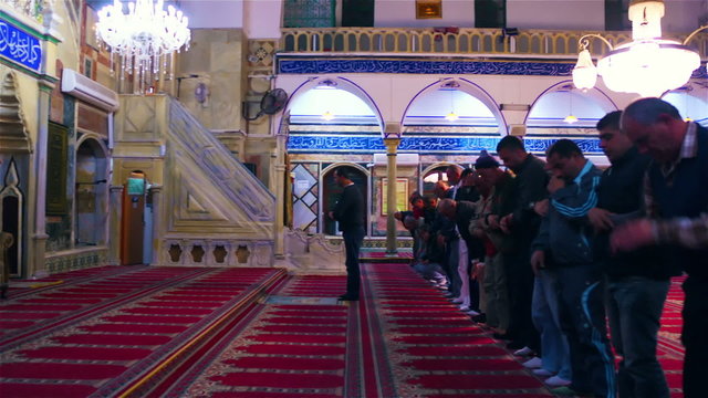 Stock Video Footage of praying at Jezzar Pasha Mosque filmed in Israel at 4k with Red.