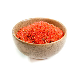 red spices in a ceramic bowl