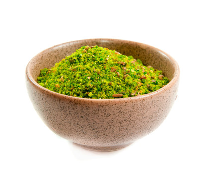 Green Spices In A Ceramic Bowl