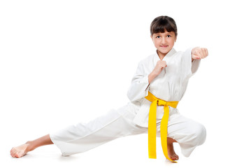 little girl in a kimono with a yellow sash © Ievgen Skrypko