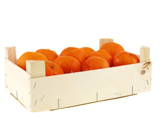 fresh tangerines in a wooden crate box