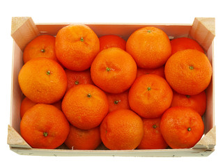 fresh tangerines in a wooden crate box