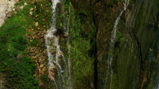Stock Video Footage of side and bottom of waterfall shot in Israel at 4k with Red.
