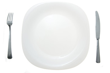 Cutlery and white plate