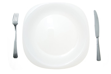 Cutlery and white plate