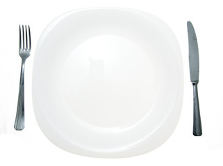 Cutlery and white plate