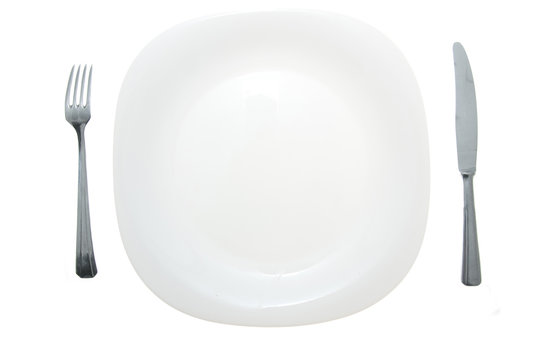 Cutlery and white plate