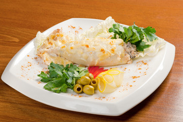 Squid Stuffed with Fish and Vegetables.