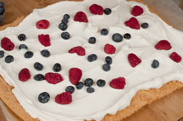 Cake with lemon and forest fruits