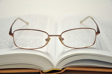glasses and book