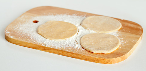 Sliced dough ready for preparing cookies/dumbplings