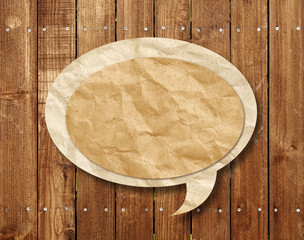 Blank Speech Bubble on wood background