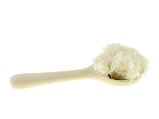 cooked rice on a wooden spoon