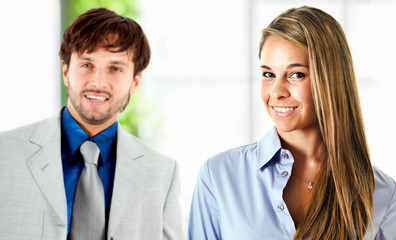Businessman and businesswoman portrait