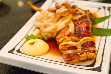 Grilled squid on dish