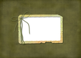 Grunge frame with bow on the green abstrsact background