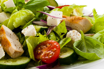 Vegetable salad with white cheese and roast chcicken meat