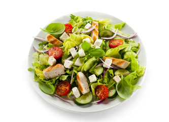 Vegetable salad with white cheese and roast chcicken meat