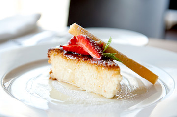 Coconut Pie with a Strawberry and Sauce from Passion Fruit