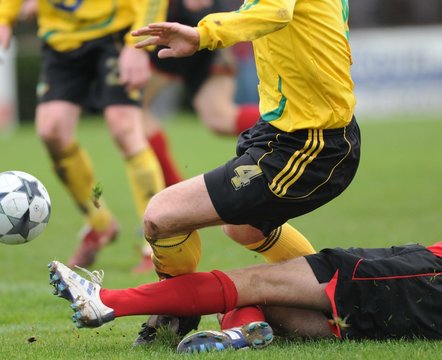 Fototapeta tacle au foot