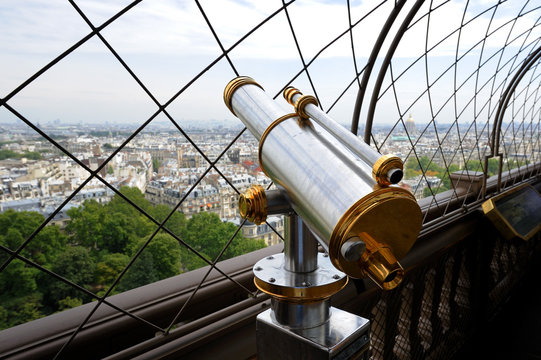 Telescope on top floor of Eiffel Tower in Paris