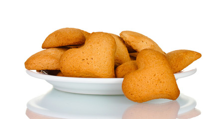 Heart-shaped cookies on white plate isolated on white