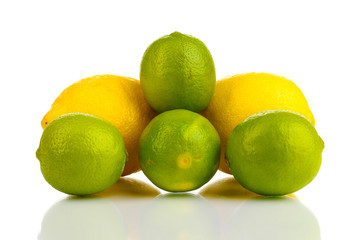 Fresh limes and lemons isolated on white