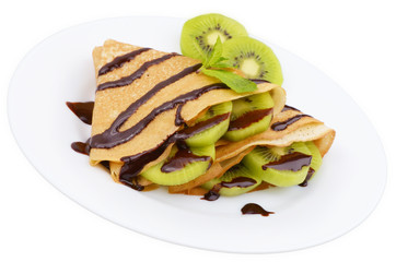 Kiwi crepes with chocolate syrup