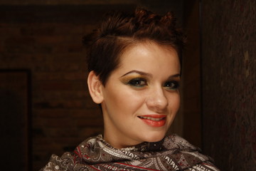 Close-up portrait of a woman with short haircut