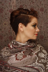 Profile of a young woman with in shawl