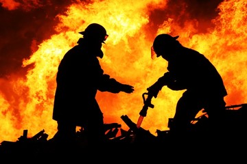 Two Fire Fighters and Huge Flames