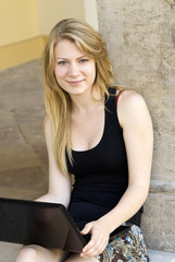 Woman with a laptop, sitting in the park