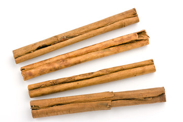 Cinnamon sticks on white