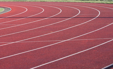 The Curves of an Athletics Track with a Red Surface.