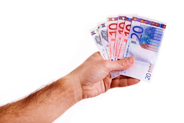 Male hand holding euro money banknotes on white background