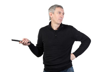 man changing channel with a remote control on white background