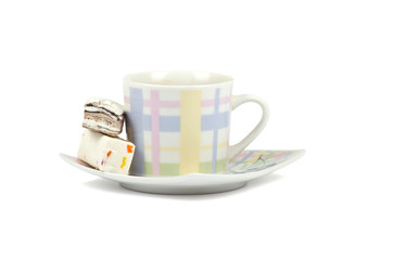 Coffee cup with sweets