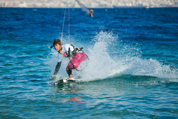 Kite surfing on the sea.