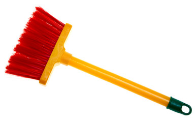 Children's toy plastic broom isolated on white background.